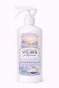 Syllabub laundry detergent bottle with lavender and black cream tea label on a white background
